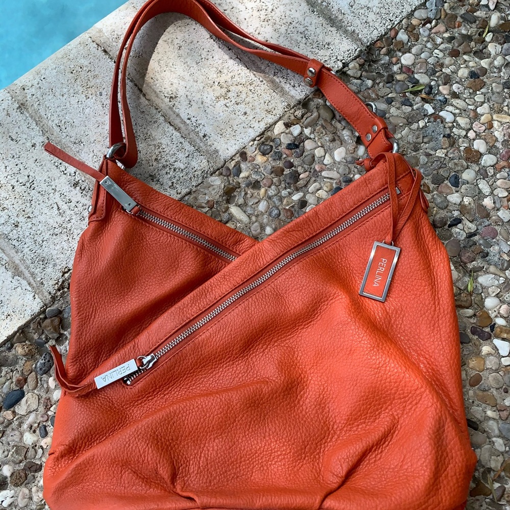 Perlina orange pebbled leather shoulder bag